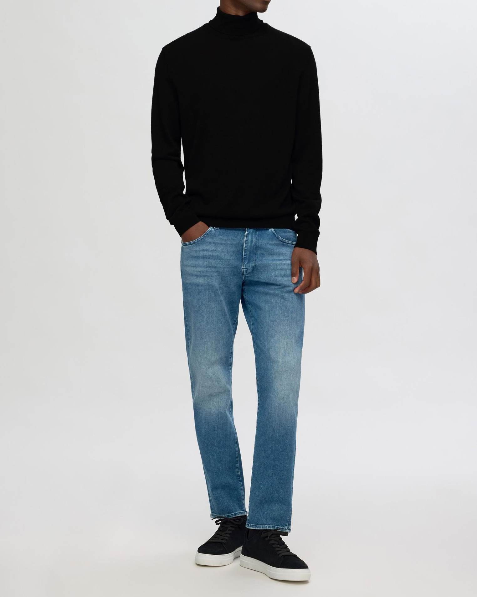 Tray Knit Merino Roll Neck Tröja